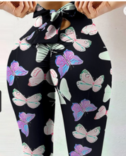 Yoga broek met vlinderprint zwart met roze en wit zijprofiel