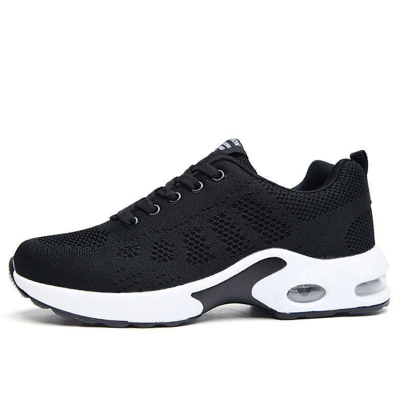 Vrouwensneakers zwart met witte luchtzolen vooraanzicht