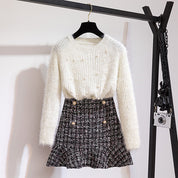 Sweater met parels wit met rokje zwart patroon vooraanzicht