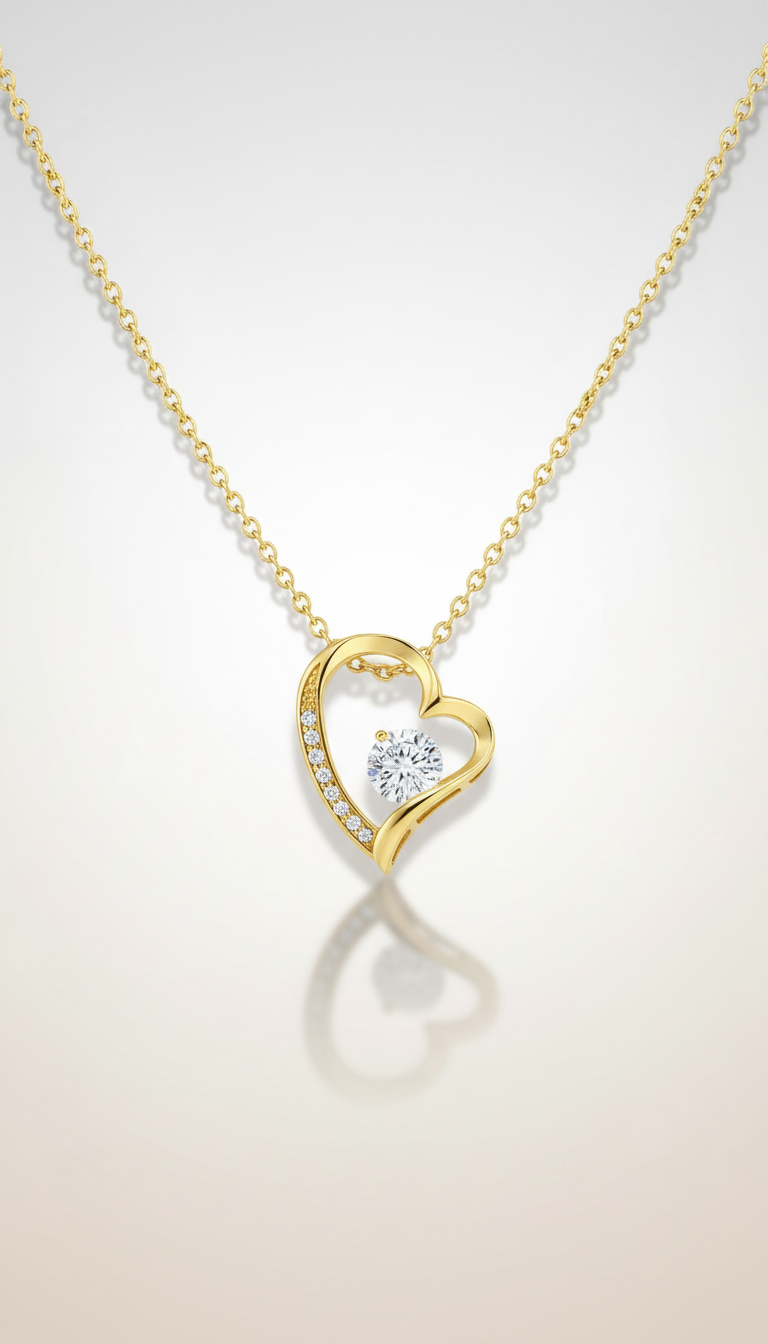 Elegante gouden dames ketting met hartvormige hanger en fonkelende steen van Labellaa