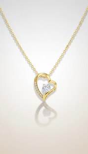 Elegante gouden dames ketting met hartvormige hanger en fonkelende steen van Labellaa